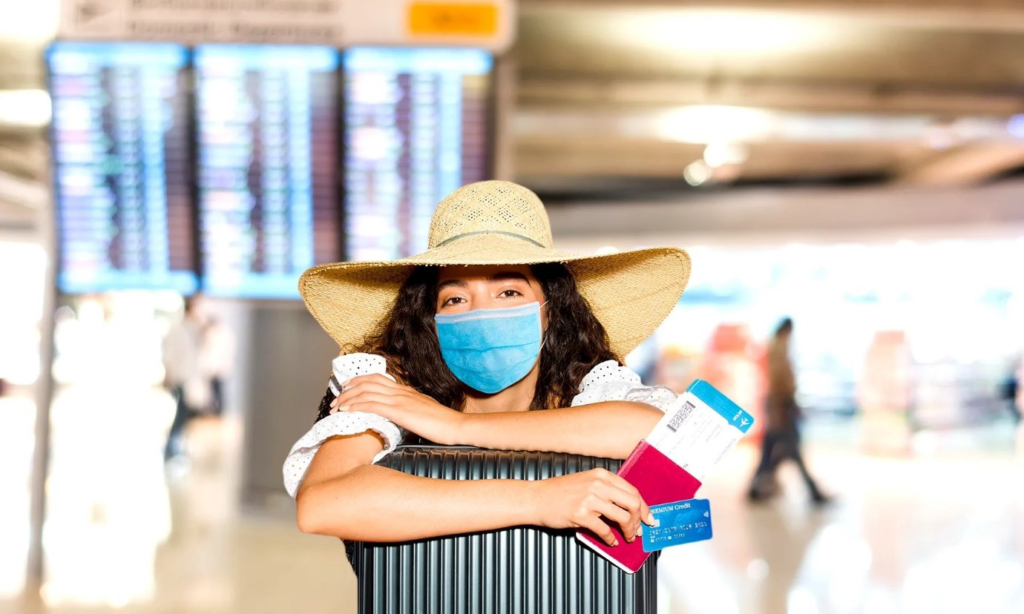 Cute girl on airport waiting with visa and passport.